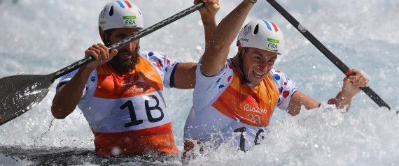France's Gauthier Klauss (R) and Matthieu Peche compete in the Men's C2 semifinal canoe slalom competition at the Whitewater stadium during the Rio 2016 Olympic Games in Rio de Janeiro on August 11, 2016. / AFP PHOTO / Carl DE SOUZA
